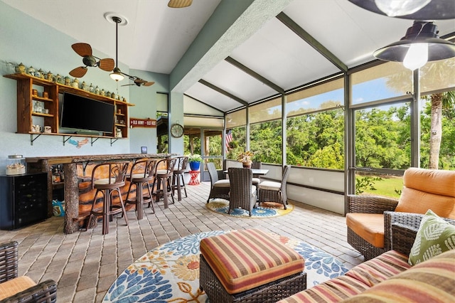5233 Fountain Walk, Lady Lake, FL 32159 - sunroom / solarium with a bar, a ceiling fan, and an outdoor living space