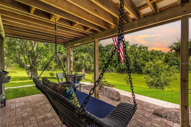 5233 Fountain Walk, Lady Lake, FL 32159 - patio terrace at dusk with a lawn and a patio area