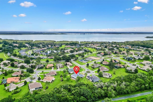 5233 Fountain Walk, Lady Lake, FL 32159 - aerial view of property's location with a nearby body of water and nearby suburban area
