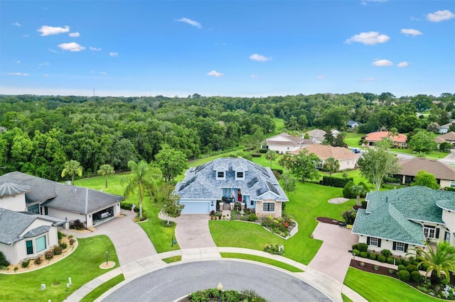 5233 Fountain Walk, Lady Lake, FL 32159 - aerial perspective of suburban area featuring a forest