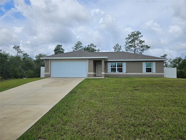 2494 SW 170th Loop, Ocala, FL 34473 - single story home with stucco siding, a garage, driveway, and a front yard