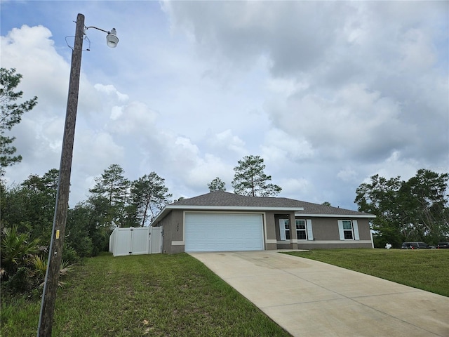 2494 SW 170th Loop, Ocala, FL 34473 - ranch-style house with an attached garage, concrete driveway, stucco siding, and a gate