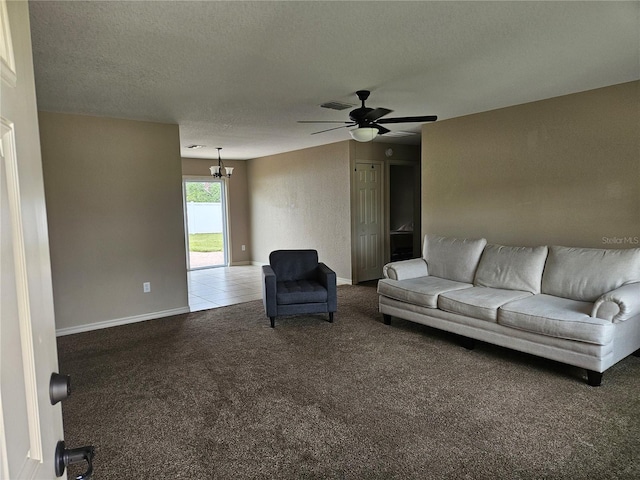2494 SW 170th Loop, Ocala, FL 34473 - carpeted living area with a chandelier, a ceiling fan, and a textured ceiling