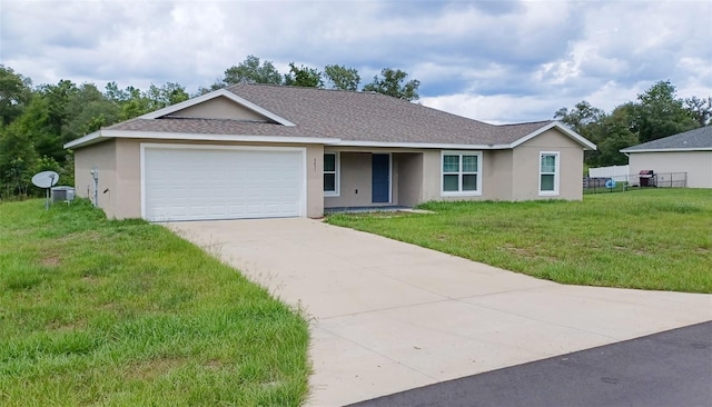 6431 SW 145th Lane Rd, Ocala, FL 34473 - ranch-style home with stucco siding, concrete driveway, a garage, a front lawn, and roof with shingles