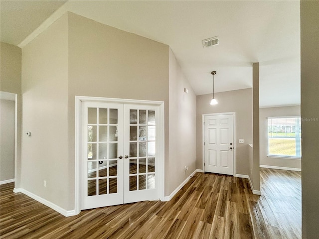 6431 SW 145th Lane Rd, Ocala, FL 34473 - entryway with vaulted ceiling, wood finished floors, and french doors