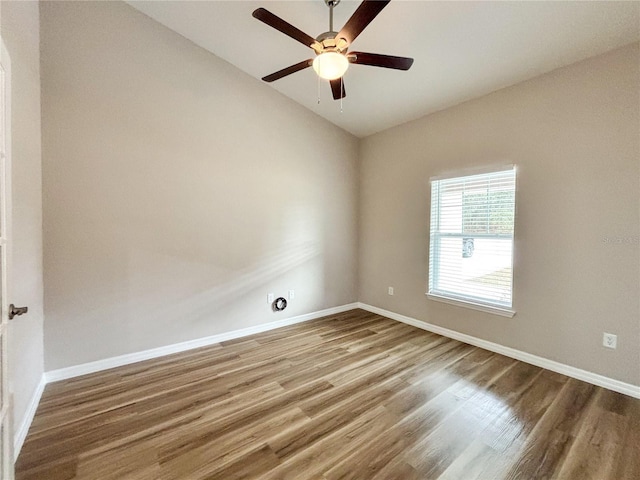 6431 SW 145th Lane Rd, Ocala, FL 34473 - unfurnished room featuring wood finished floors, a ceiling fan, and vaulted ceiling