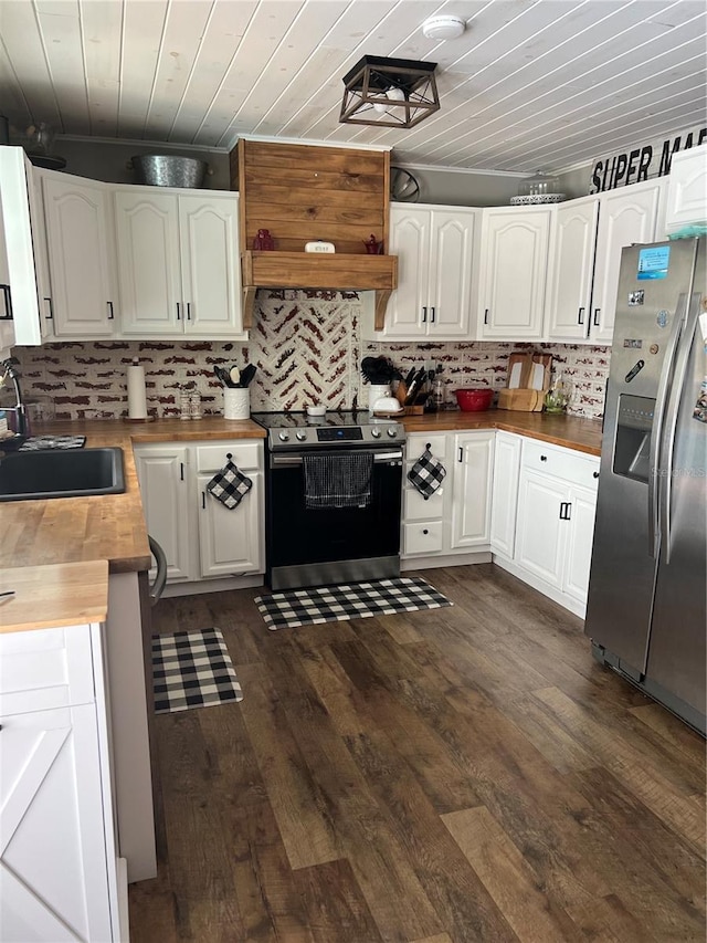 5561 NE 5th Pl, Ocala, FL 34470 - kitchen featuring appliances with stainless steel finishes, butcher block countertops, backsplash, white cabinets, and wood ceiling