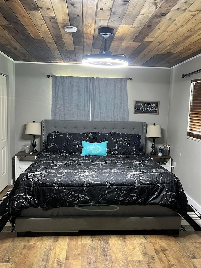 5561 NE 5th Pl, Ocala, FL 34470 - bedroom featuring wood ceiling and hardwood / wood-style floors