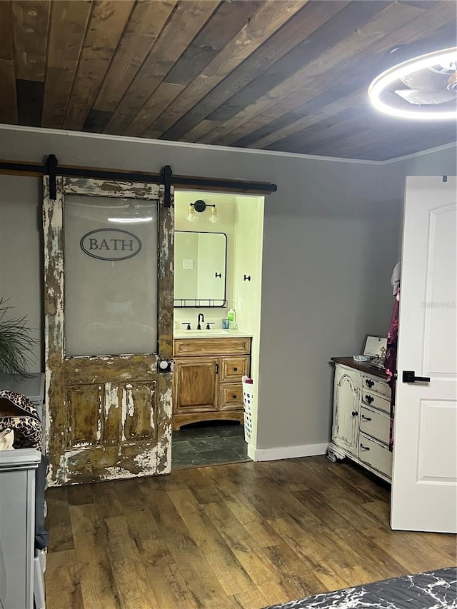 5561 NE 5th Pl, Ocala, FL 34470 - bathroom with wood finished floors, vanity, and wooden ceiling