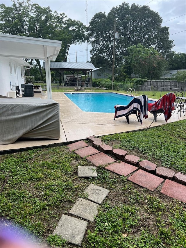 5561 NE 5th Pl, Ocala, FL 34470 - view of swimming pool with a patio area and a gazebo