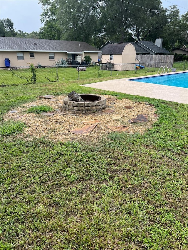 5561 NE 5th Pl, Ocala, FL 34470 - view of yard featuring an outdoor fire pit