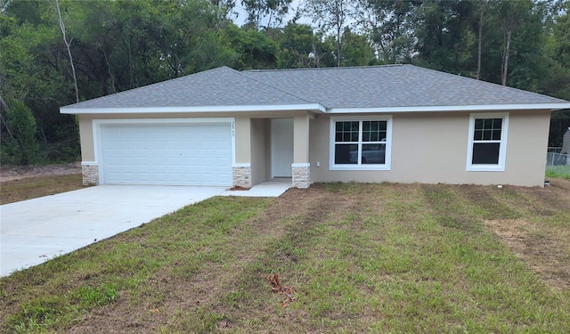 2869 SE 142nd Pl, Summerfield, FL 34491 - single story home with an attached garage, stucco siding, roof with shingles, concrete driveway, and stone siding