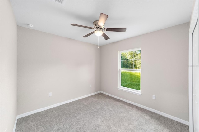 2869 SE 142nd Pl, Summerfield, FL 34491 - carpeted empty room featuring a ceiling fan and a smoke detector