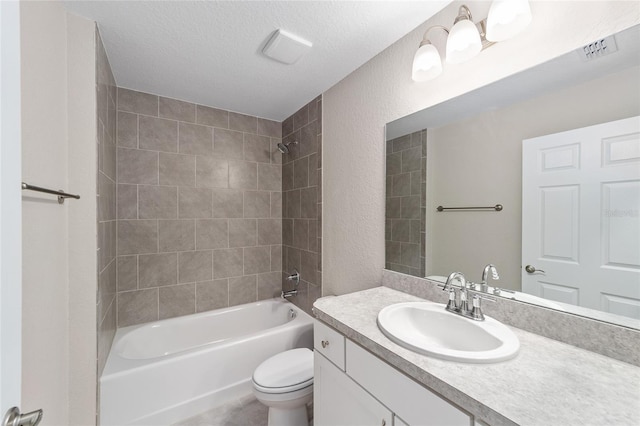 2869 SE 142nd Pl, Summerfield, FL 34491 - full bath with vanity, shower / tub combination, a textured ceiling, and a textured wall