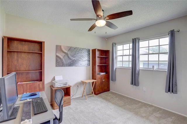 13006 Pebble Beach Cir, Hudson, FL 34667 - office with a ceiling fan, carpet floors, and a textured ceiling