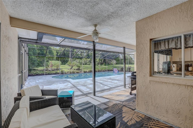 13006 Pebble Beach Cir, Hudson, FL 34667 - sunroom featuring ceiling fan and a pool