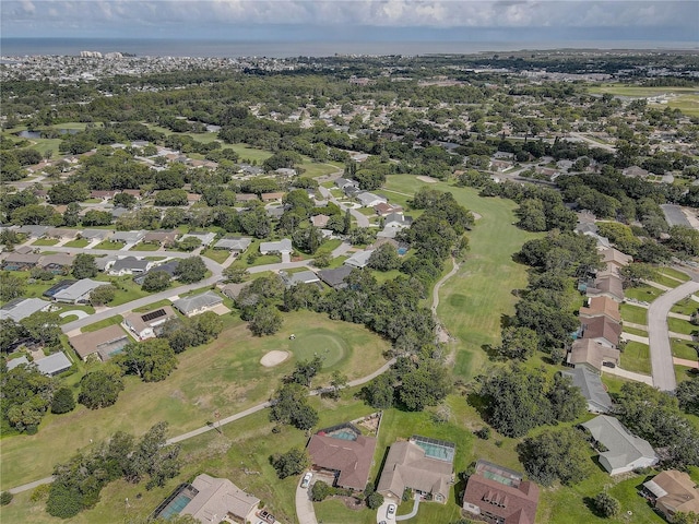 13006 Pebble Beach Cir, Hudson, FL 34667 - aerial overview of property's location with a local golf course and nearby suburban area