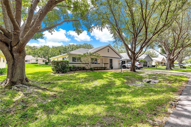 9664 SW 94th Ter Unit A, Ocala, FL 34481 - ranch-style home featuring a front yard and a residential view
