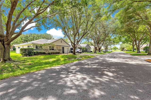 9664 SW 94th Ter Unit A, Ocala, FL 34481 - view of asphalt street with a residential view