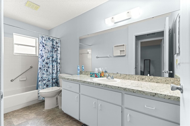 9664 SW 94th Ter Unit A, Ocala, FL 34481 - bathroom featuring vanity, shower / tub combo, and a textured ceiling