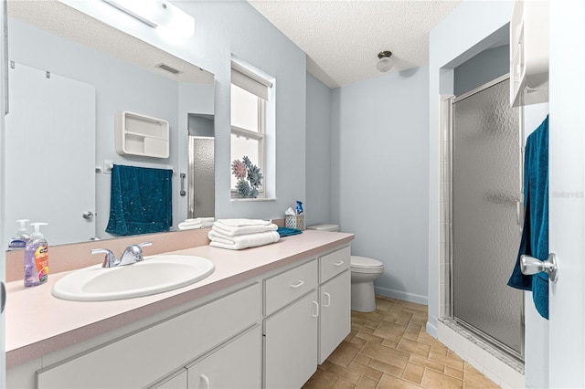 9664 SW 94th Ter Unit A, Ocala, FL 34481 - bathroom with a shower stall, vanity, stone finish flooring, and a textured ceiling