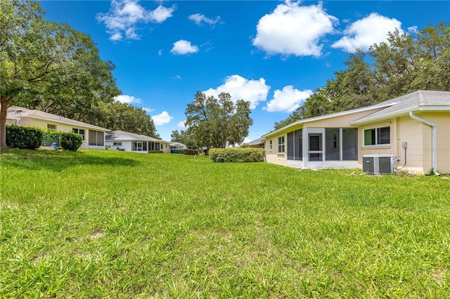 9664 SW 94th Ter Unit A, Ocala, FL 34481 - view of grassy yard with a sunroom