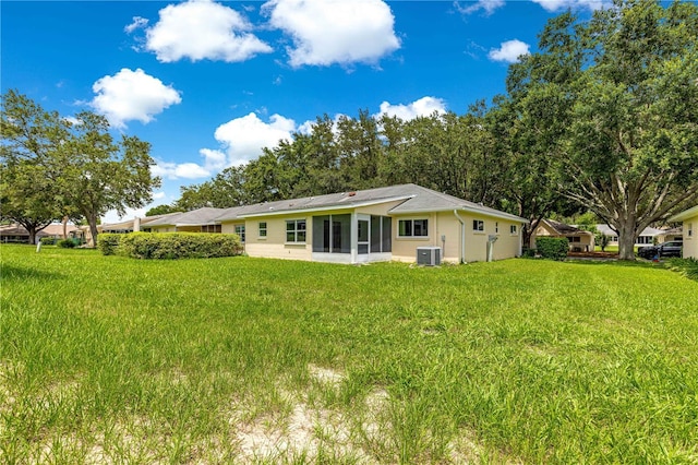 9664 SW 94th Ter Unit A, Ocala, FL 34481 - back of property featuring a sunroom and a yard