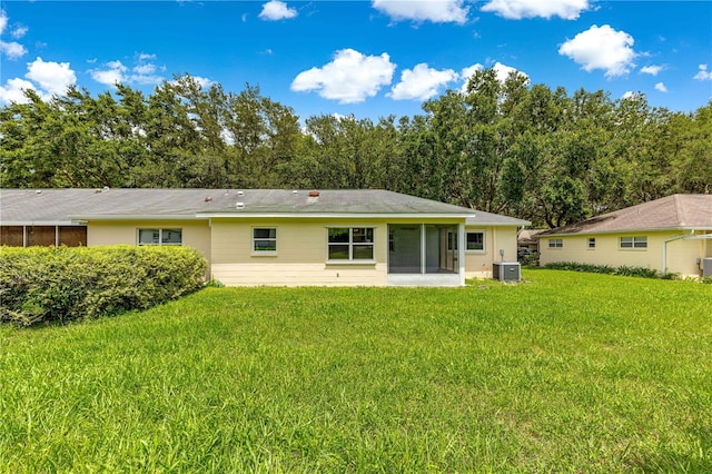 9664 SW 94th Ter Unit A, Ocala, FL 34481 - back of property featuring a sunroom and a yard