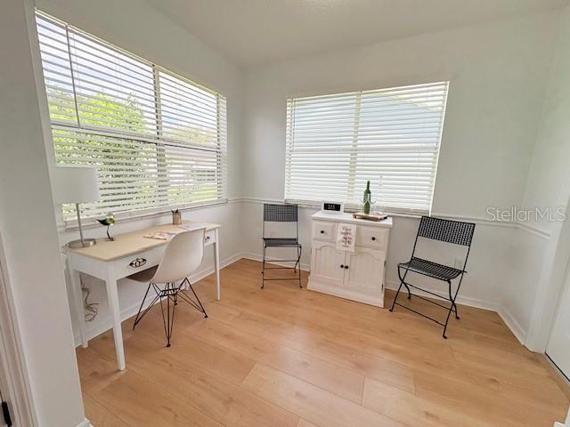 528 Valencia Pl, Lady Lake, FL 32159 - home office featuring light wood finished floors and baseboards