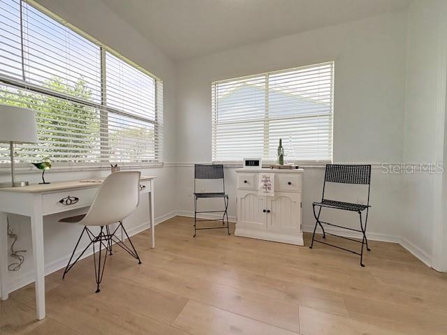 528 Valencia Pl, Lady Lake, FL 32159 - office space with light wood-style floors and baseboards