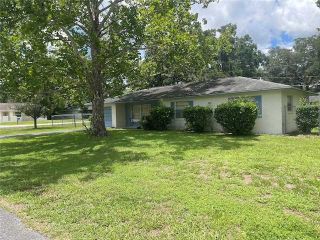 5501 SE 2nd Pl, Ocala, FL 34480 - view of front of home featuring stucco siding and an attached garage