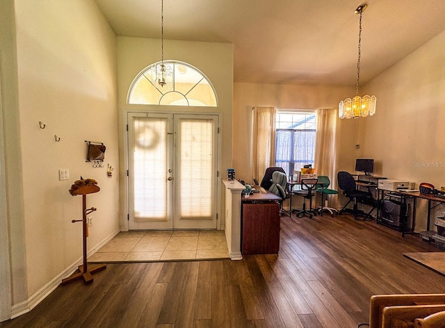 8671 SW 57th Court Rd, Ocala, FL 34476 - entryway featuring a chandelier, wood finished floors, and french doors