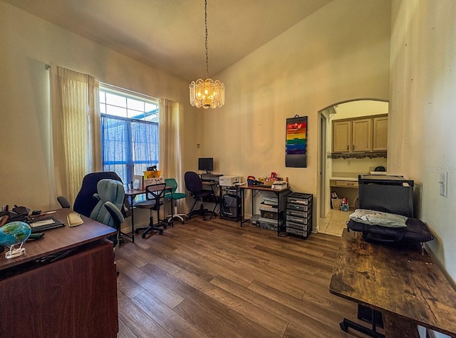 8671 SW 57th Court Rd, Ocala, FL 34476 - home office with dark wood-type flooring, a chandelier, and a high ceiling