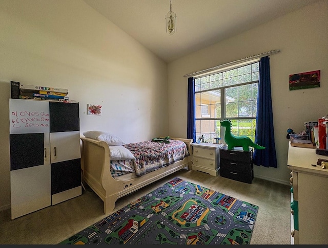 8671 SW 57th Court Rd, Ocala, FL 34476 - carpeted bedroom featuring vaulted ceiling and baseboards