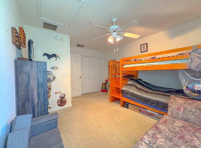 8671 SW 57th Court Rd, Ocala, FL 34476 - carpeted bedroom featuring attic access, a closet, and ceiling fan
