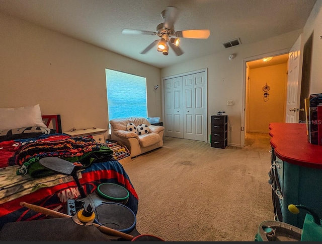8671 SW 57th Court Rd, Ocala, FL 34476 - bedroom with light carpet, a closet, and ceiling fan