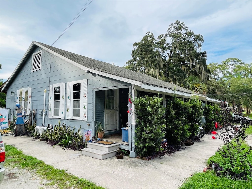 805 NW 24th Pl, Ocala, FL 34475 - view of front of property featuring a shingled roof