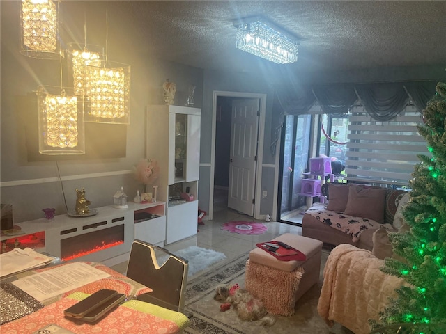 3106 S Semoran Blvd Unit 5, Orlando, FL 32822 - tiled bedroom with a chandelier and a textured ceiling