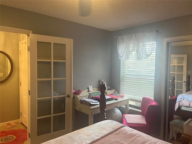 3106 S Semoran Blvd Unit 5, Orlando, FL 32822 - bedroom with a textured ceiling