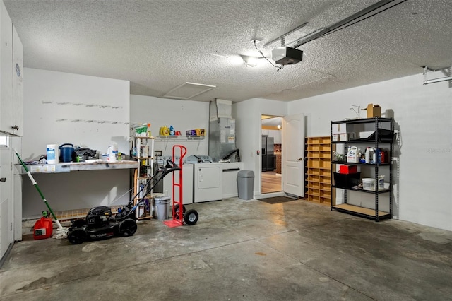 3224 E Davis Ln Unit 29, Inverness, FL 34453 - garage with washing machine and clothes dryer, a garage door opener, black refrigerator with ice dispenser, and heating unit