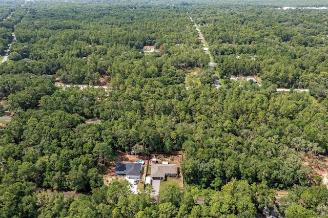 3224 E Davis Ln Unit 29, Inverness, FL 34453 - aerial view of property and surrounding area with a heavily wooded area