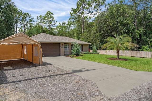 3224 E Davis Ln Unit 29, Inverness, FL 34453 - ranch-style house with concrete driveway, a garage, stucco siding, and view of scattered trees