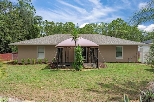3224 E Davis Ln Unit 29, Inverness, FL 34453 - back of property with stucco siding and a gazebo