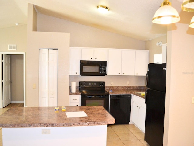 254 Marion Oaks Mnr, Ocala, FL 34473 - kitchen with black appliances, white cabinets, light tile patterned floors, a kitchen island, and high vaulted ceiling