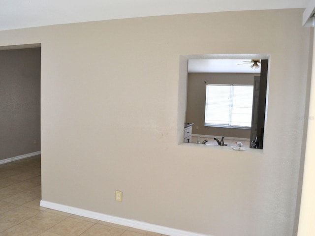 254 Marion Oaks Mnr, Ocala, FL 34473 - unfurnished room featuring a ceiling fan and light tile patterned floors