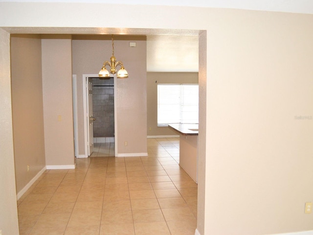 254 Marion Oaks Mnr, Ocala, FL 34473 - unfurnished dining area featuring a chandelier and light tile patterned floors