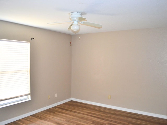254 Marion Oaks Mnr, Ocala, FL 34473 - empty room featuring a ceiling fan and wood finished floors