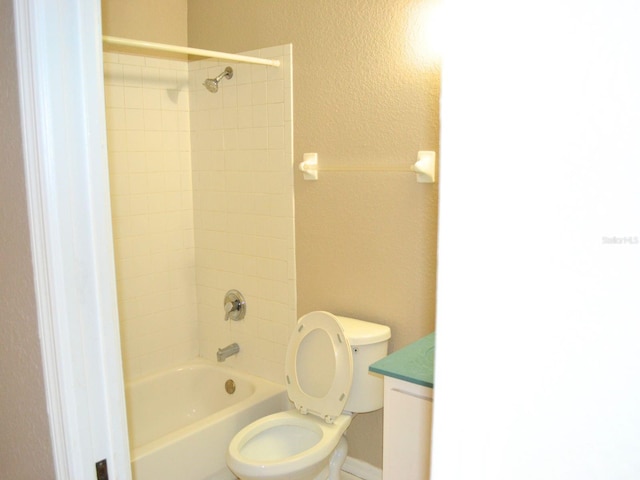 254 Marion Oaks Mnr, Ocala, FL 34473 - full bathroom with shower / tub combination, vanity, and a textured wall