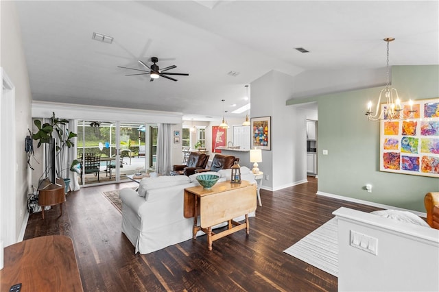 1882 E Monopoly Loop, Inverness, FL 34453 - living area with vaulted ceiling, ceiling fan, a chandelier, and dark wood finished floors