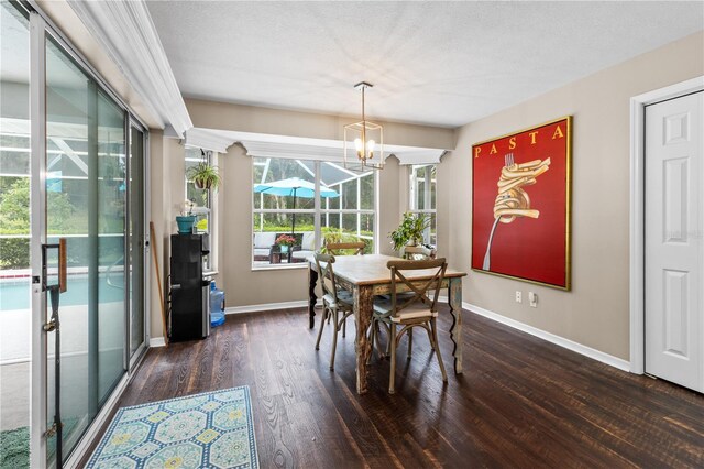 1882 E Monopoly Loop, Inverness, FL 34453 - dining area with dark wood finished floors and a chandelier